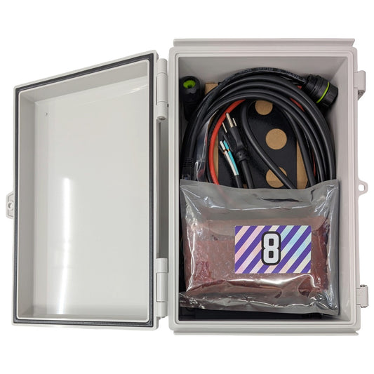 Close up view of a Cosmic 8-Series DIY build kit with all of the components packed inside to enclosure