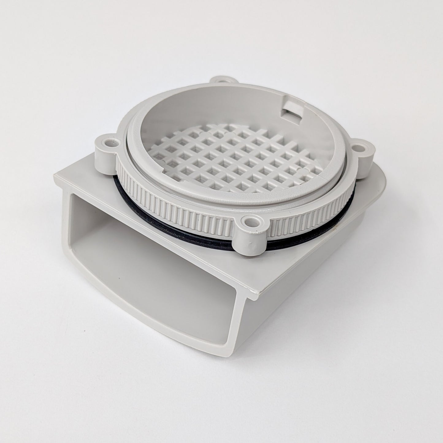 Gray plastic enclosure vent with a grid on a white background