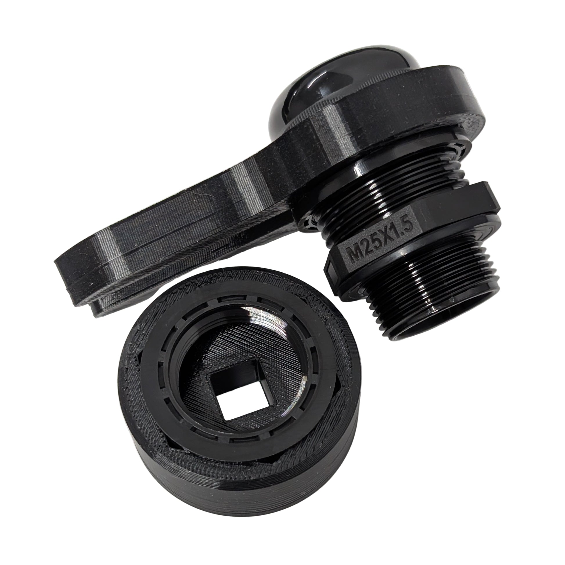 Close up view of two black 33mm cable gland tools on a white background with a M25 cable gland.