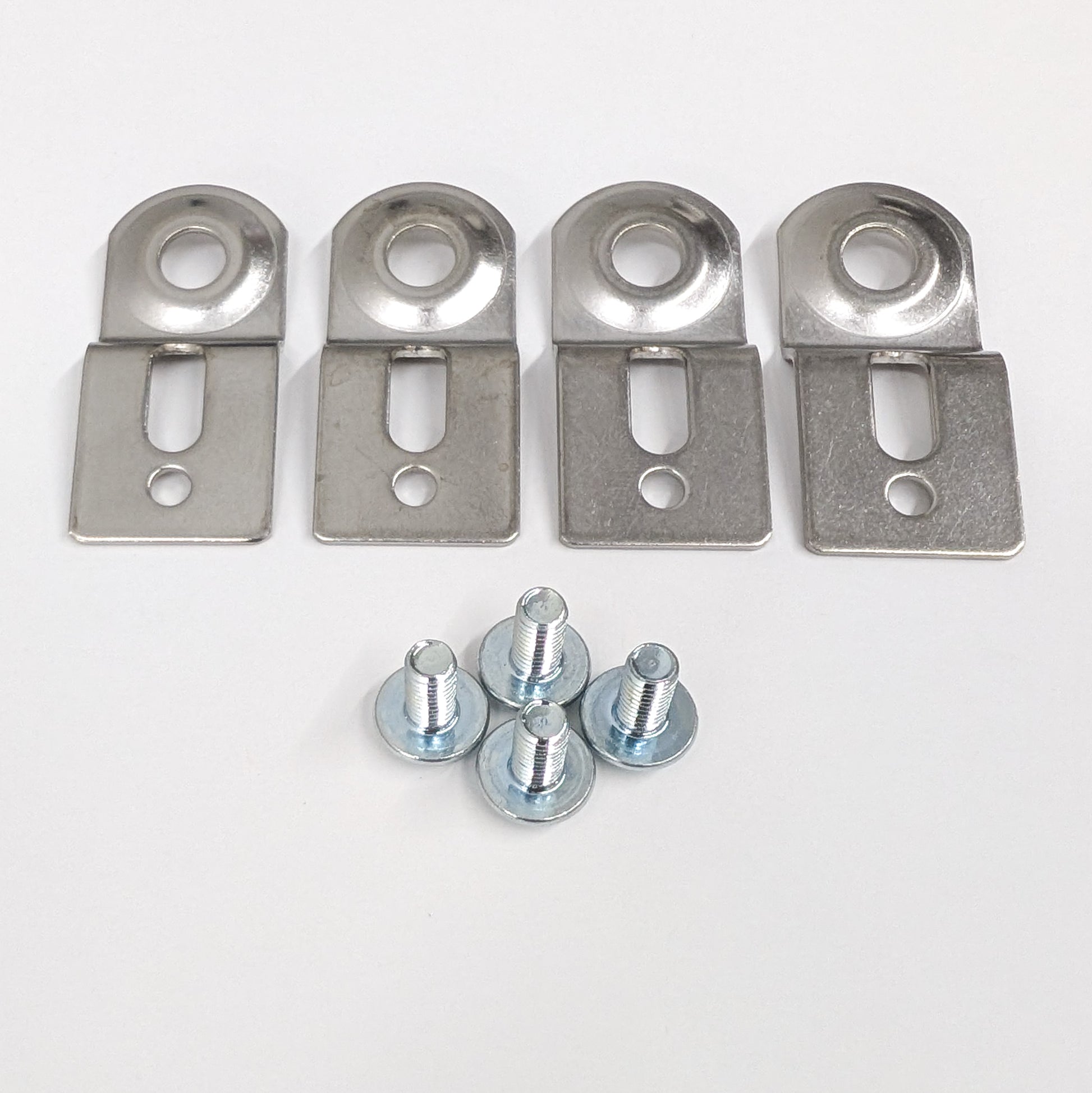 Set of four metal mounting brackets and with screws on a white background