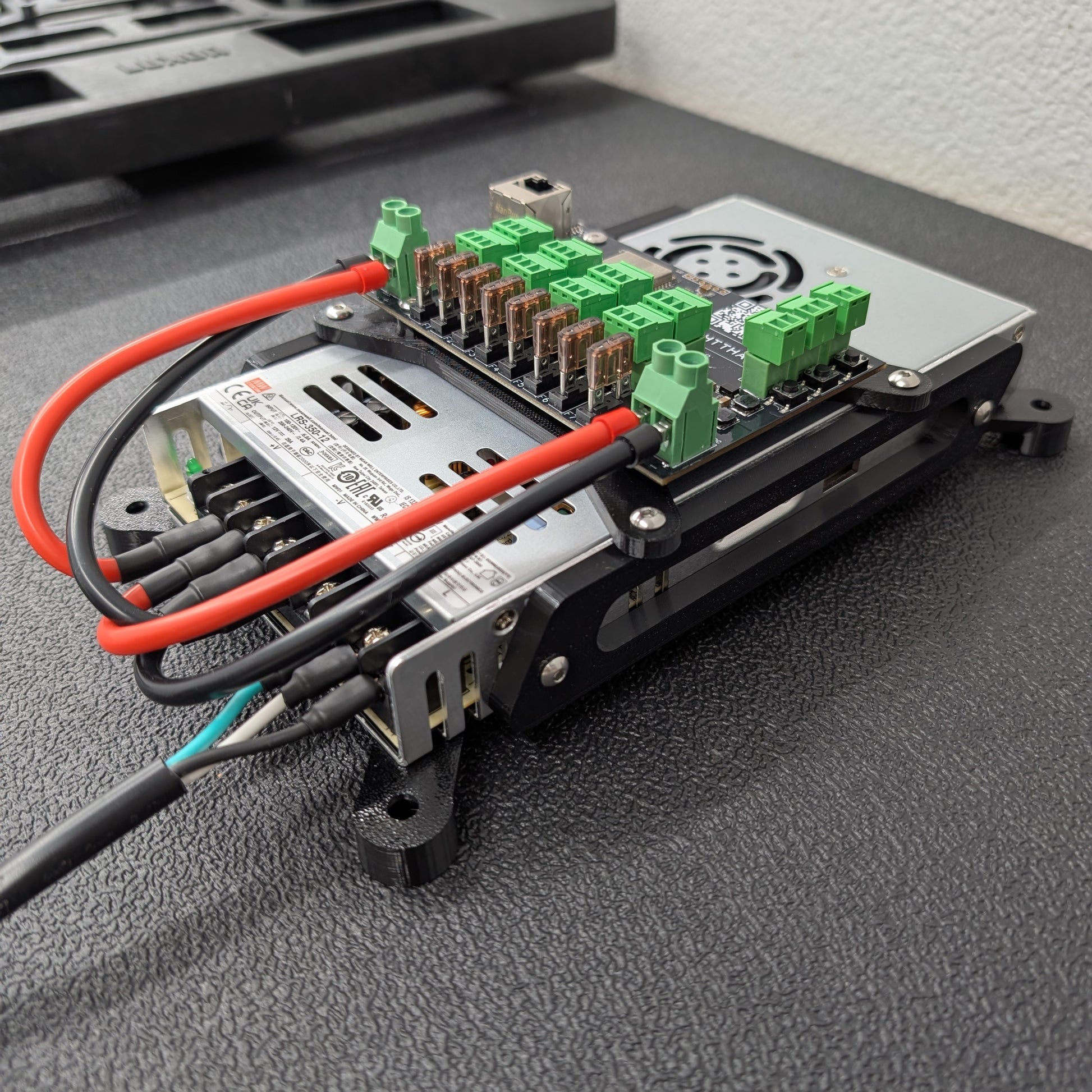 Close up view of Baldrick8 build kit showing brackets and wire routing