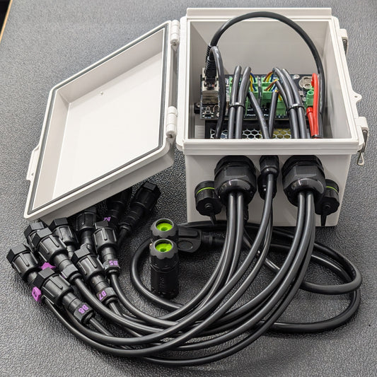 Open enclosure – left angle, showing Ethernet/USB access and cable glands