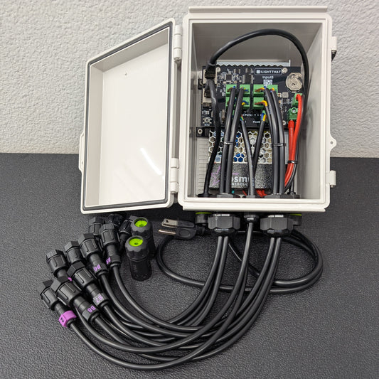 Open enclosure showing wiring, inputs, and pixel ports – right angle