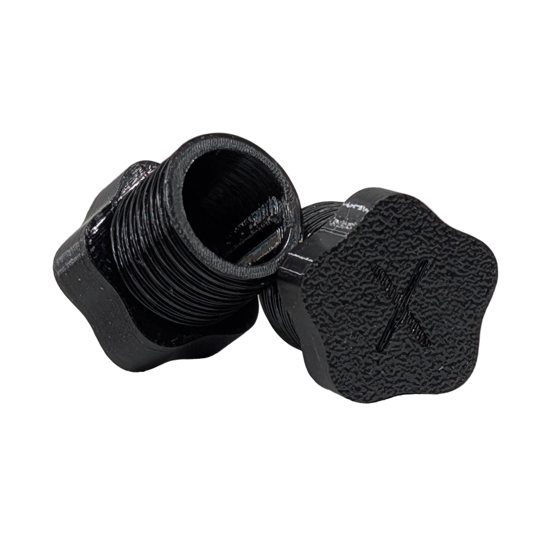 Star shaped black plastic threaded xConnect plug on a white background