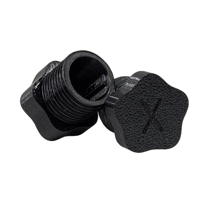 Star shaped black plastic threaded xConnect plug on a white background